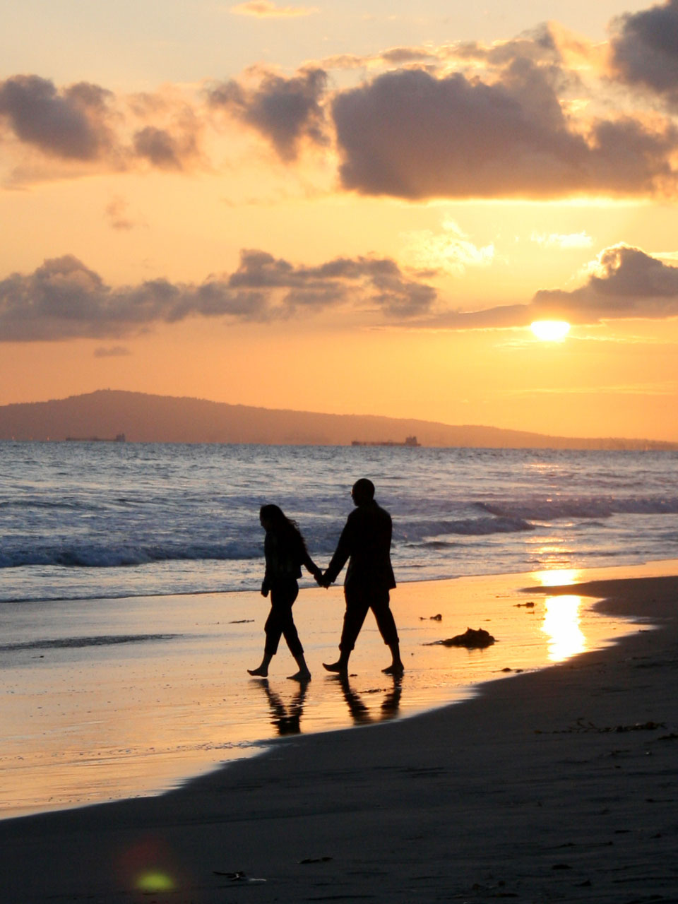 Sunset Stroll On The Beach
